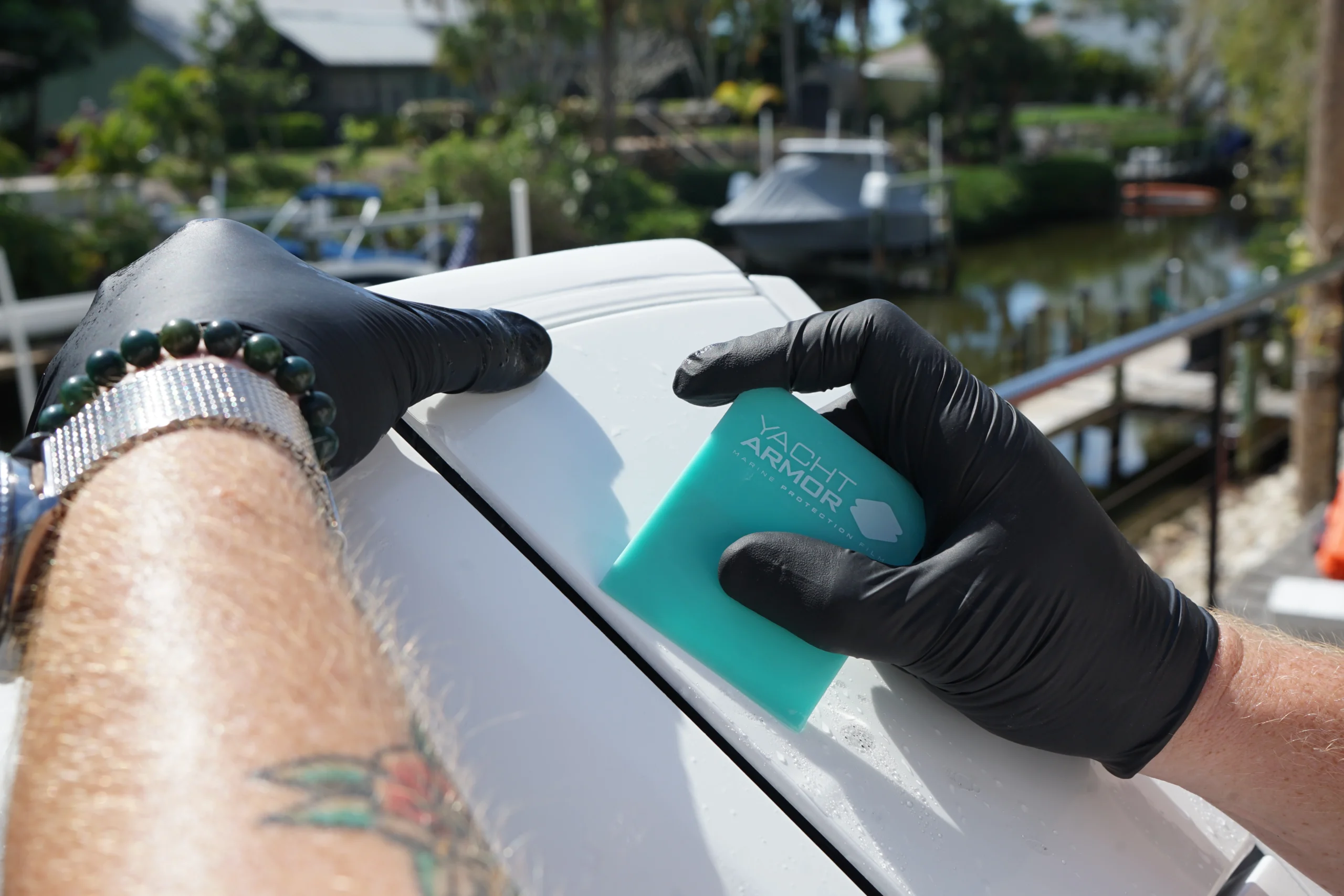 Hand-applied compound and polish during a hull oxidation restoration in Sarasota FL
